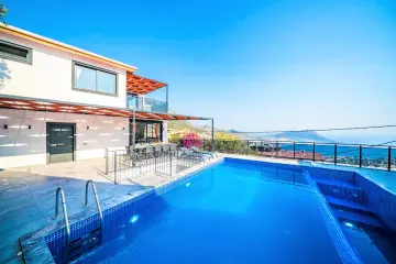 Villa Ocean Kalkan private rental villa in Akbel, with 5 bedrooms and a capacity of 10 people, with sea view, is ideal for large families and large groups of friends.