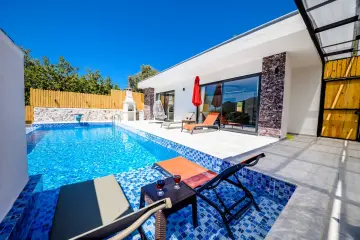 Villa Kumru is located in Kalkan İslamlar region and has 2 bedrooms and a jacuzzi with a capacity of 4 people.