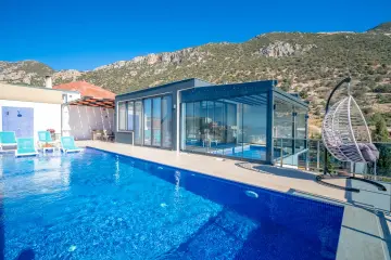 Kalkan Holiday Villa Spring 1 is a holiday villa with a capacity of 4 people located in Antalya/Kaş/Kalkan/Kördere region.