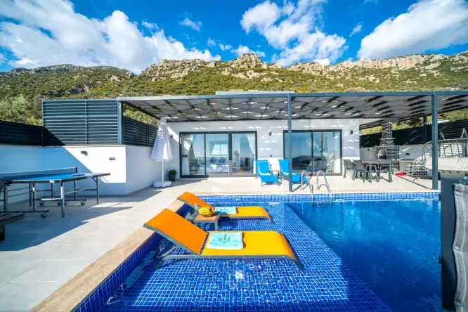 Villa Mühür is located in the Kördere district of Kalkan. It is a luxury holiday villa with 2 bedrooms, a capacity for 4 people, a jacuzzi and sea view.